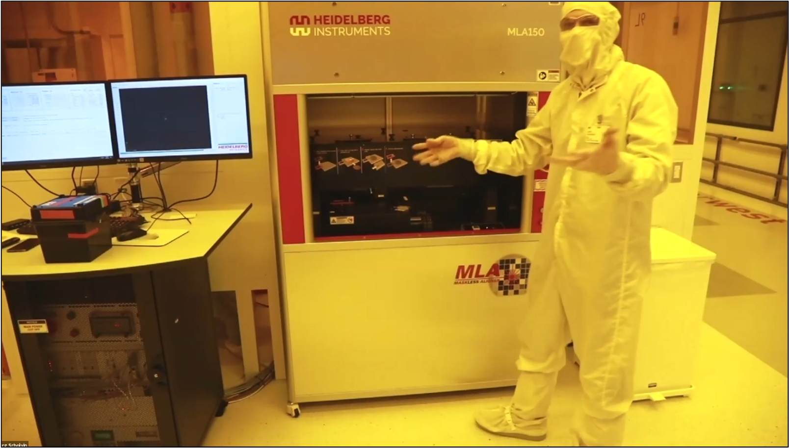 Scholvin explains the operation principle of the MLA tool while the coated wafer is being exposed using a 405 nanometer blue laser.