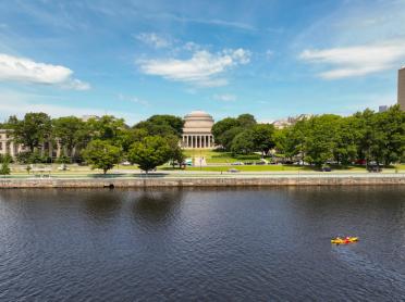 A photo of the Charles River with the MIT Dome in the background.