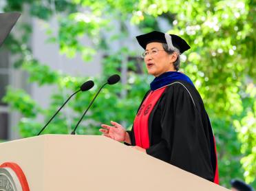 Lisa Su speaks at a podium