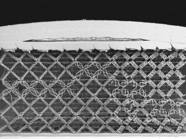 This image of a woven deformable metamaterial was taken with a scanning electron microscope.